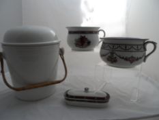 An Antique White Pottery Pail having a bamboo handle together with two chamber pots and a soap dish