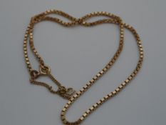 9ct gold hallmark box chain necklace, the chain having a fine safety chain, 38 cms, 9 grams.