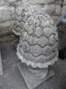 A Pair of Stone Garden Ornaments in the form of Acorns