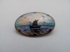 A 925 Silver and Enamel Oval Pin Brooch, the brooch depicting a Norwegian ship in full sail.