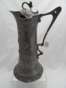 Art Nouveau Tudric style Pewter Water Jug, depicting hops and vine. 41 cms