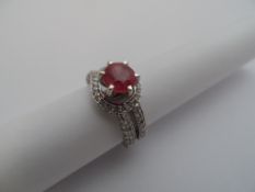 14 ct white gold ladies ruby and diamond ring, the 585 hallmark ring set with solitaire ruby 2.40