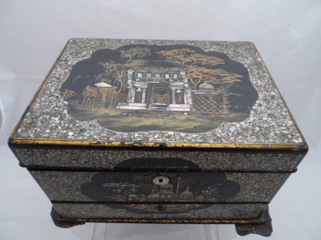 A Vanity Writing Box, the box being mother of pearl and lacquer, circa 1850, the box having