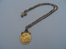 Half Gold Sovereign on Chain, a solid gold George V half sovereign dated 1913 on a 9 ct gold