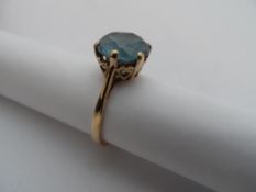 9 ct gold and blue stone ladies ring, The ring in claw and heart shaped mount setting, size L, 2.8