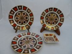 Royal Crown Derby; three Imari pattern plates, two nr 1128 xl and the other 1128 L11 together with a