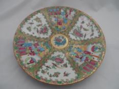 A Circa 1800 Chinese Famille Rose Plate; the plate depicting birds, butterflies, insects and various