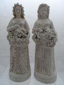 Two Parian Ware Figures; the figures depicting ladies carrying fruit (2) 33 cms. ( W A F )