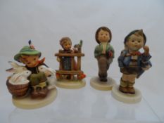 Miscellaneous Goebel figurines including nr 203 `girl at gate`, 58/u boy with rabbits, 709 boy