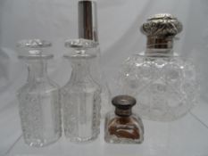 Miscellaneous collection of cut glass including one Birmingham hallmark m.m GU round perfume