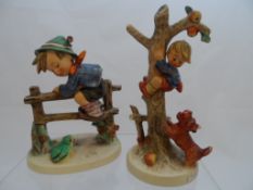 Miscellaneous Goebel figurines including 201/I 1948 boy on a fence, 36A boy climbing a tree (2)