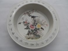 Chinese ceramic deep bowl, the bowl hand painted with birds and flowers to the interior and