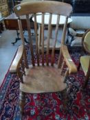 Highback Farmhouse Armchair, the Elm seated chair having slatted back with arm rest on turned