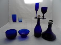 A collection of Bristol blue glass; including a Sherry decanter, Ships decanter with cork stopper