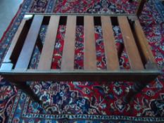 A Victorian Mahogany Luggage Rack; the rack having brass rails and turned feet, approx. 38 x 62 x 44