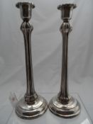 Pair of Silver Plated Art Nouveau candlesticks of foliate design.