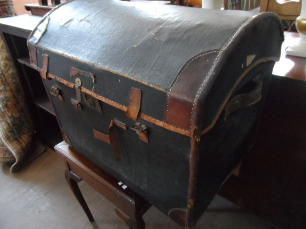 A Vintage Leather and Canvas Domed Trunk, containing misc. Edwardian gent`s clothing incl. square