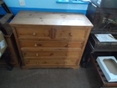 Pine Chest of Drawers having two short and three long drawers on plinth base with turned handles,