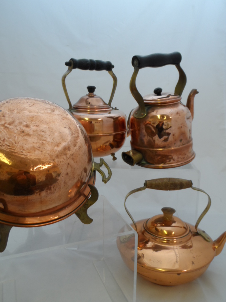 Collection of miscellaneous copper including three copper kettles with ebonised handles, miniature