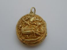 Antique Indian Gold fronted locket, the locket depicting Indian deity, 16 grams total.
