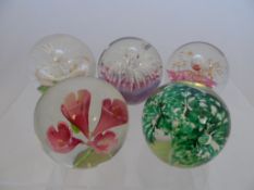 Five Glass Paperweights, floral deisigns