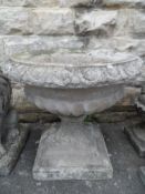A Pair of Haddon Stone Garden Urns; one being w a f