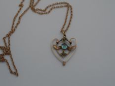 Edwardian Aquamarine coloured Heart Pendant, the pendant on gold chain, with heart shaped scroll