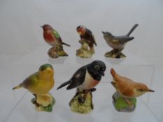 Miscellaneous collection of Beswick Porcelain Garden Birds including two 105 green finch, 2274 stone