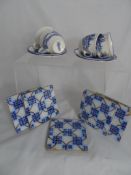 Ten blue and white Pas de Calais Desires ceramic tiles together with four Royal Doulton `Norfolk`