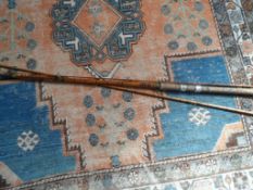 Antique split cane salmon rod, a three piece hexagonal Linden rod in canvas slip case