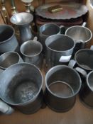 Collection of miscellaneous metal items including eleven pewter tankards, vase, a pair of