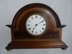 An Edwardian inlaid mahogany mantle clock, having Buren Swiss movement (WAF) on brass ball feet
