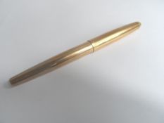 A Vintage Gold Plated Parker Ink Pen having a 14 K gold nib