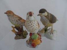 Two Mistle Thrush Figures on naturalistic bases, decorated in matt polychrome, Royal Worcester model