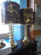 Unusual Brass Lamp Stands, with two lamp shades of metallic finish. (2)