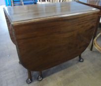 Edwardian mahogany drop leaf table, on cabriole legs and pad feet, approx. 160 x 90 x 77 cms.