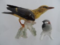 A Goebel Figure of a Yellow Breasted Fly Catcher on a branch, decorated in polychrome, approx. 13