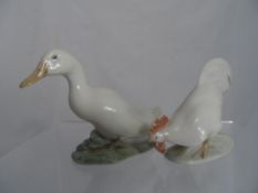 Royal Copenhagen Porcelain Figure of a duck and cockerel, the duck #1192 and the cockerel #1127.