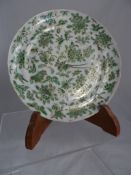 An antique Chinese Famille Verte Plate, the plate being decorated with exotic birds, flowers,