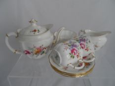 Part Royal Crown Derby `Derby Posies` tea set comprising four tea cups and saucers, tea pot, milk