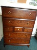 A Stag chest of drawers having four long drawers and three short drawers to the centre, approx. 82 x