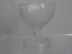 A hand blown Bohemian glass goblet etched with frosted glass depicting a hunting scene