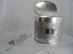 A collection of misc. silver and silver plate incl. a silver plated tea caddy by Garrard & Co.