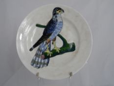 A porcelain plate depicting a falcon by Prado