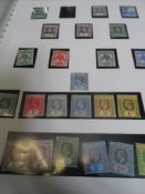 A large quantity of Commonwealth Stamps, in fifteen albums, mostly modern mint but with some KE