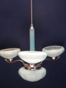 Art Deco Turquoise Ceiling Light, the light with opaque glass stem and three turquoise shades.