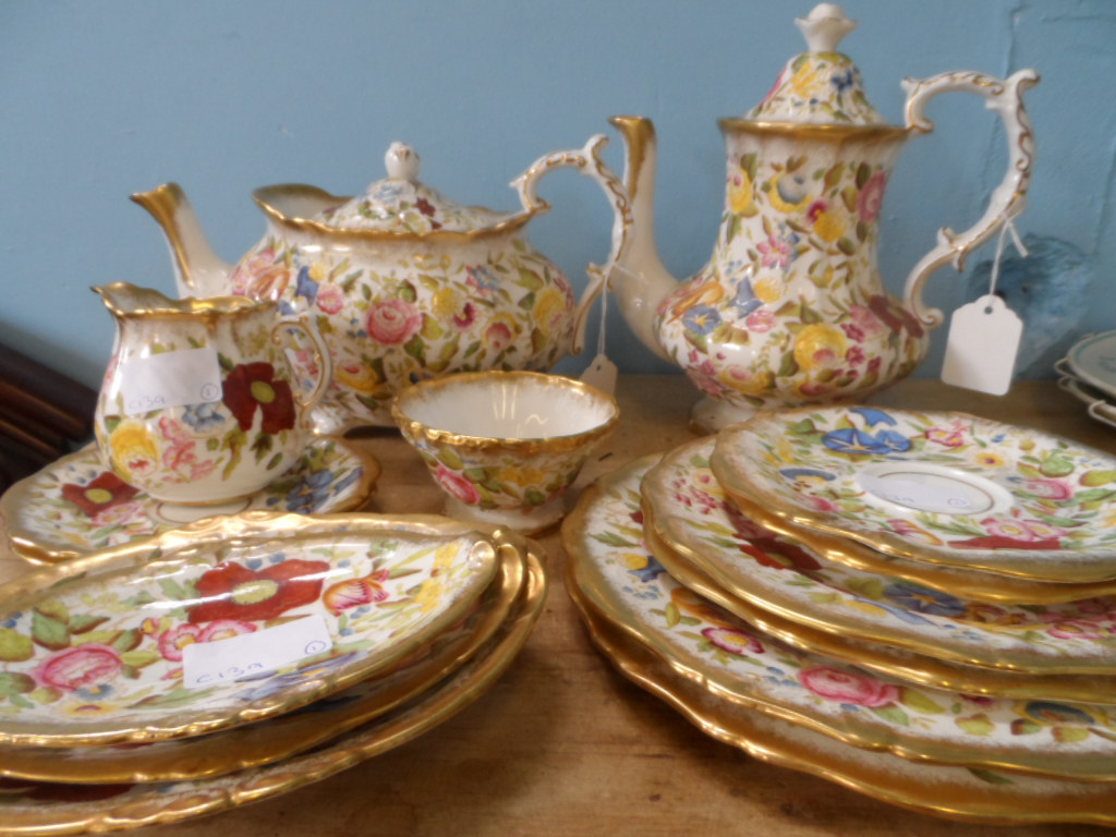 A part Hammersley & Co Tea Set, hand painted with flowers incl. coffee pot, teapot, milk jug, two