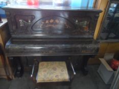 A Vintage Upright Piano by John Spencer & Co. London the piano having 1920`s inlay and brass