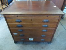 Edwardian Mahogany Plan Chest the chest with five graduated drawers and pull out slide to the top.