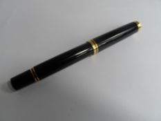 A Vintage Pelikan Ink Pen having a 14 C 585 gold nib.